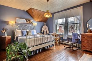 Postel nebo postele na pokoji v ubytování À L'Ancestrale B&B