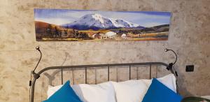 Postel nebo postele na pokoji v ubytování La Corte B&B