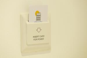 a light switch with the north grid forever sign on it at Belvedere Luxury Rooms - Breathtaking View in Split