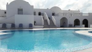 Bazén v ubytování Villa Iliovasilema Santorini nebo v jeho okolí