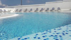 Bazén v ubytování Villa Iliovasilema Santorini nebo v jeho okolí