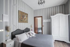 Postel nebo postele na pokoji v ubytování Hotel Residenza In Farnese