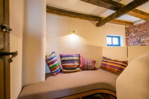 Tempat tidur dalam kamar di Friday Gent