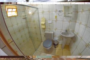 Koupelna v ubytování Pousada e Hostel Chapada Suites
