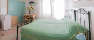 Postel nebo postele na pokoji v ubytování AL BORGO VACANZE B&B