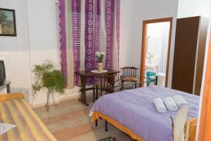 Postel nebo postele na pokoji v ubytování AL BORGO VACANZE B&B