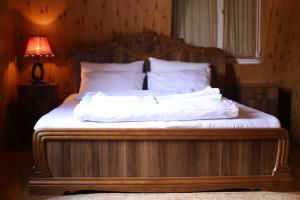 Voodi või voodid majutusasutuse Hotel Nikala toas