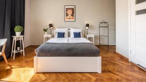 Posteľ alebo postele v izbe v ubytovaní Fenna Apartments 7 minut od Rynku
