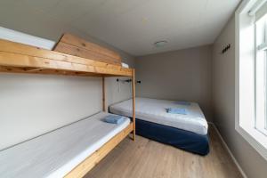Krevet ili kreveti u jedinici u okviru objekta Isafjordur Hostel