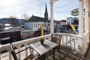 Balkón nebo terasa v ubytování Hotel Grand Cafe Deight