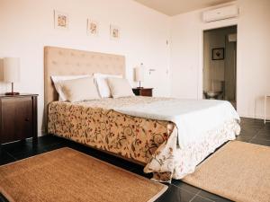 Katil atau katil-katil dalam bilik di Casa das Barcas