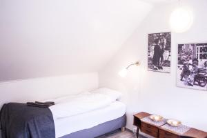 Katil atau katil-katil dalam bilik di Fossardalur Guesthouse