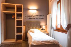 Voodi või voodid majutusasutuse Albergo Maggiorina toas