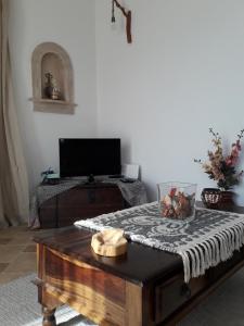 Postel nebo postele na pokoji v ubytování Villa Polymnia