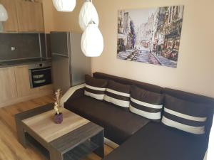 A seating area at Victorio Lux Apartments