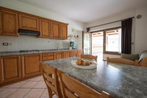 Kuchyňa alebo kuchynka v ubytovaní Agritur Comai