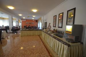 TV a/nebo společenská místnost v ubytování Hotel Astoria