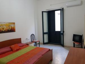 Postel nebo postele na pokoji v ubytování Casa Francy a 5min da Marzamemi