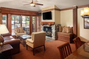 a living room with a fireplace and a television at Hyatt Vacation Club at High Sierra Lodge in Incline Village