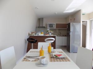 Kuchyň nebo kuchyňský kout v ubytování CMB Guesthouse + 26 fotografií