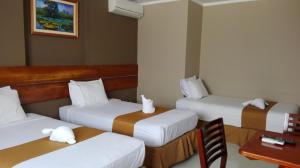 Postel nebo postele na pokoji v ubytování Bora Hotel