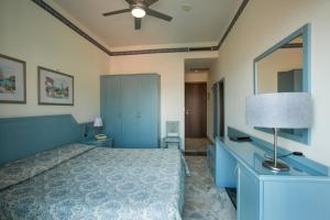 Кровать или кровати в номере Hotel Ariston