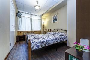 Кровать или кровати в номере Shabolovka Hotel