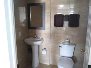 Koupelna v ubytování Aries Motel