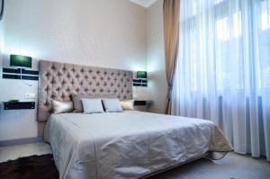 Posteľ alebo postele v izbe v ubytovaní Viktoria Luxury Apartment