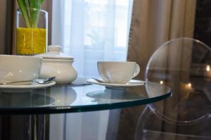 Príslušenstvo na prípravu kávy alebo čaju v ubytovaní Viktoria Luxury Apartment