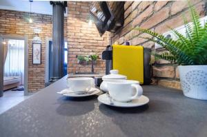 Príslušenstvo na prípravu kávy alebo čaju v ubytovaní Viktoria Luxury Apartment
