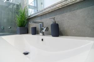 Kúpeľňa v ubytovaní Viktoria Luxury Apartment