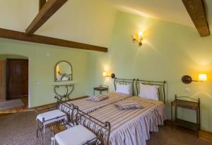 Un pat sau paturi într-o cameră la Unglerus Guesthouse