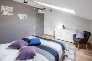Кровать или кровати в номере Apart Hotel Code 10