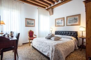 Llit o llits en una habitació de Ca' Santo Spirito B&B