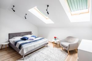 Кровать или кровати в номере Apart Hotel Code 10