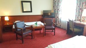 Postel nebo postele na pokoji v ubytování Landhotel Jagdhof
