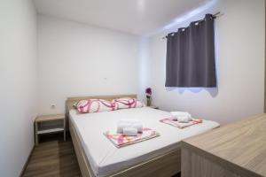 Postel nebo postele na pokoji v ubytování Luxury Mobile Homes Liza