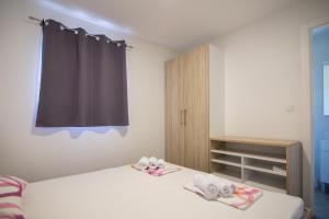 Postel nebo postele na pokoji v ubytování Luxury Mobile Homes Liza
