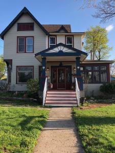 a house with a pathway leading to the front door at Blue Gables Bed and Breakfast in Niagara Falls