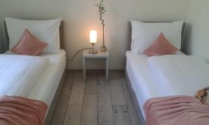 Postel nebo postele na pokoji v ubytování Apartment VILLA MERCI
