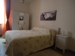 Katil atau katil-katil dalam bilik di Casa Vacanze Centro Storico Verona