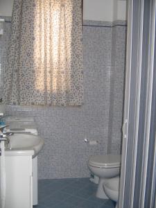 Kúpeľňa v ubytovaní Annalisa Apartments 250 dal mare