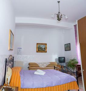 Postel nebo postele na pokoji v ubytování AL BORGO VACANZE B&B