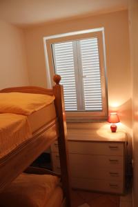 Кровать или кровати в номере Green Paradise Apartment Novalja