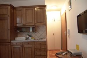 Кухня или мини-кухня в Green Paradise Apartment Novalja
