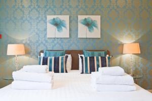 Posteľ alebo postele v izbe v ubytovaní Harrogate Boutique Apartments - Self Contained Apartments