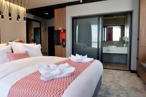 Katil atau katil-katil dalam bilik di Hotel Panoramika Design & Spa