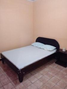 Postel nebo postele na pokoji v ubytování Hotel Latino