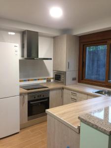 A kitchen or kitchenette at Illas Atlanticas